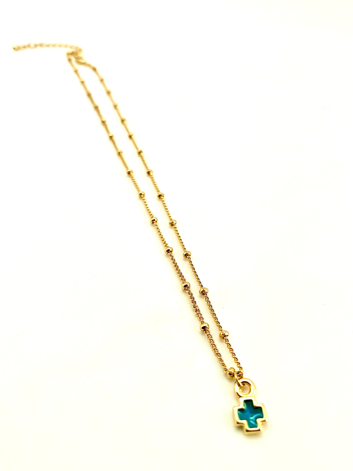 Cadena cruz pequeña