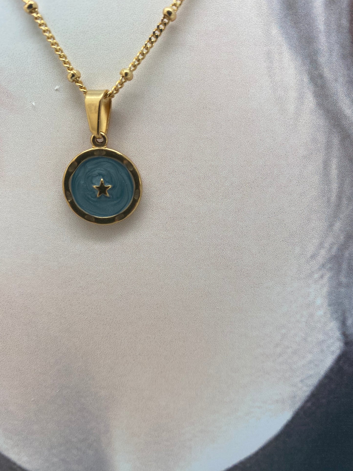 Cadena medalla estrella azul