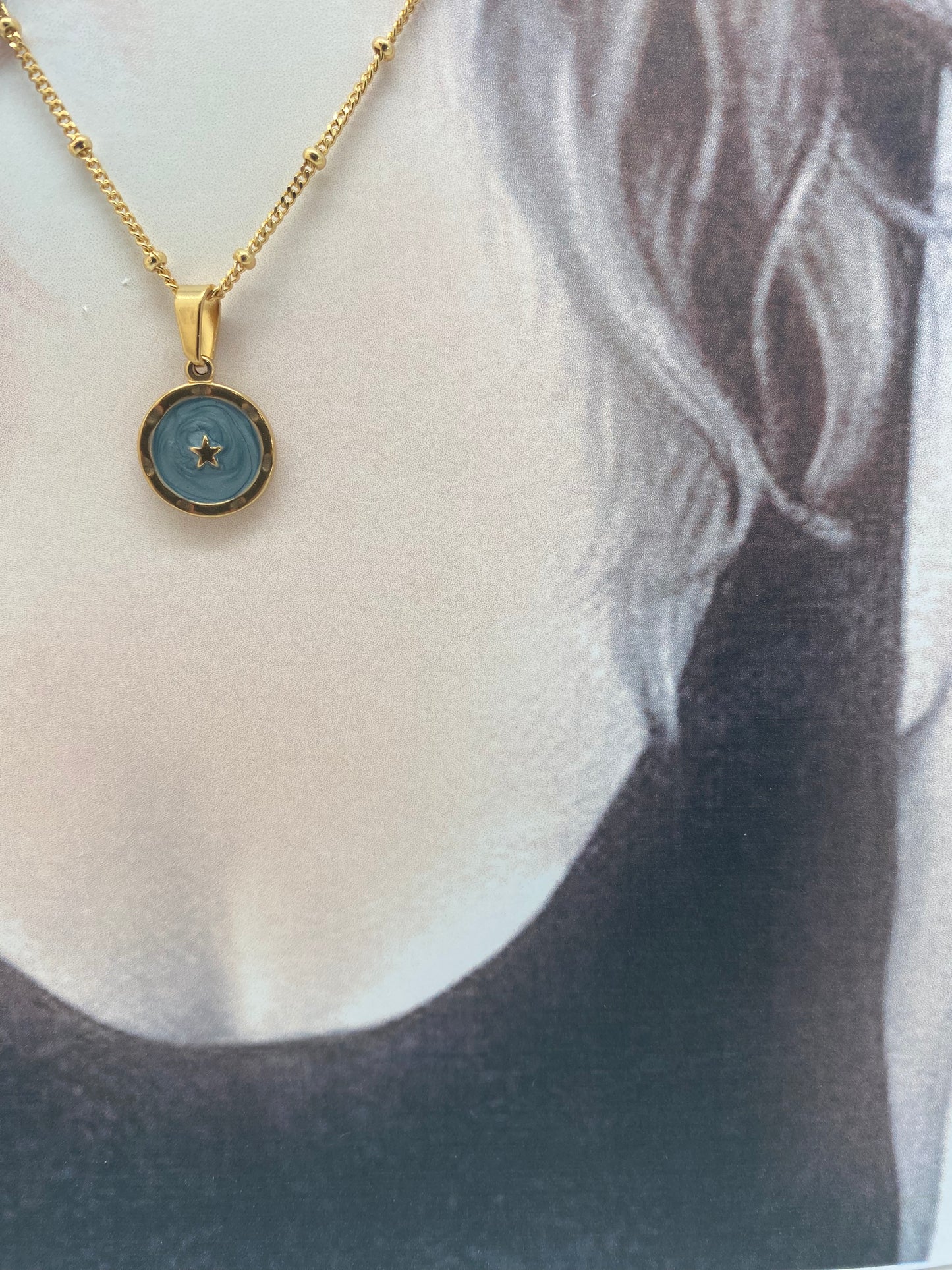Cadena medalla estrella azul