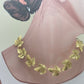 Collar de hojas de parra