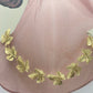 Collar de hojas de parra