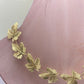 Collar de hojas de parra