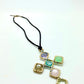 Collar cruz piedras