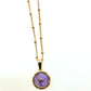 Cadena medalla estrella morada
